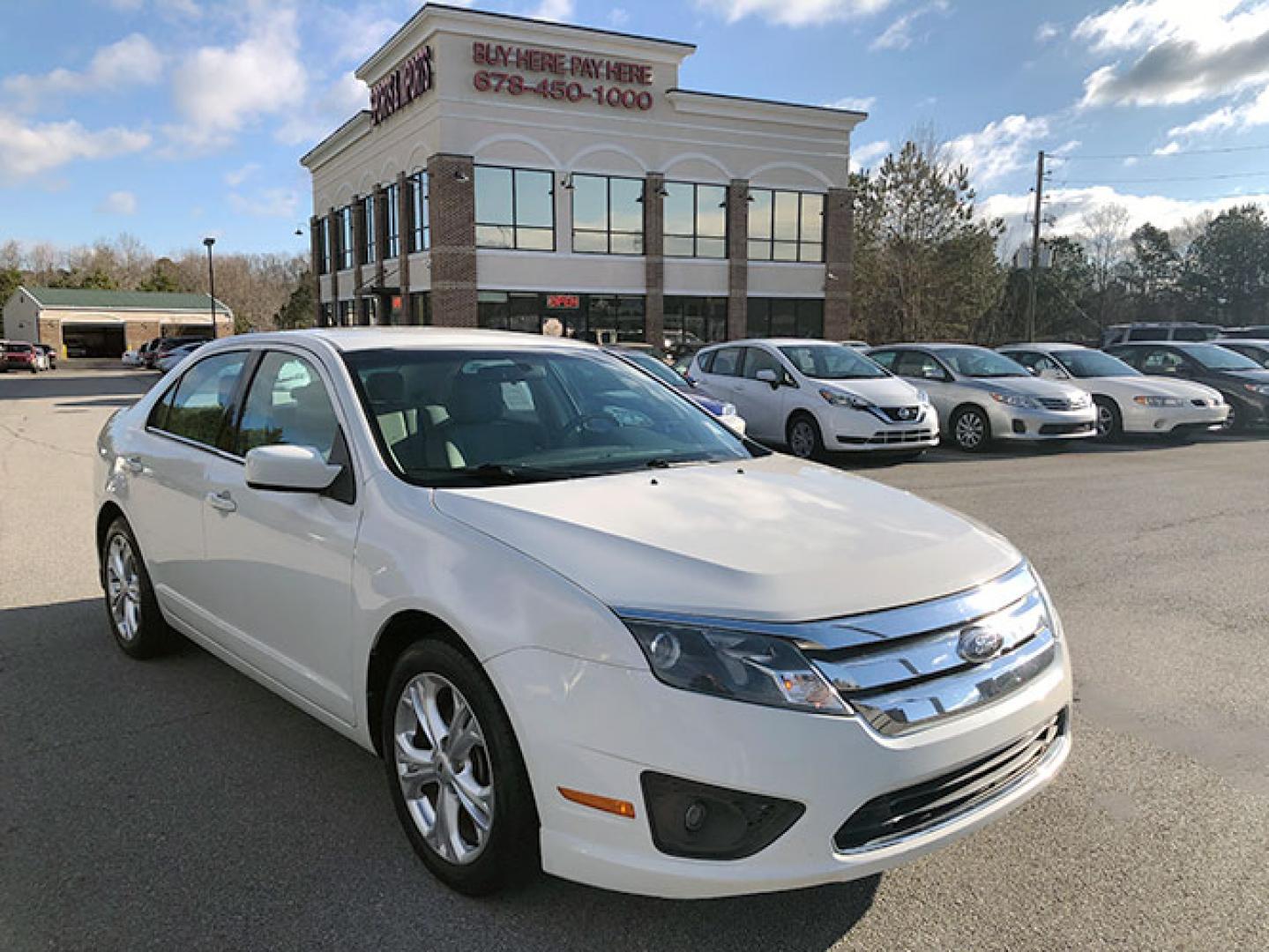 2012 Ford Fusion SE (3FAHP0HA5CR) with an 2.5L L4 DOHC 16V engine, located at 620 Jesse Jewell Pkwy, Gainesville, GA, 30501, (678) 450-1000, 34.305923, -83.809784 - Photo#0
