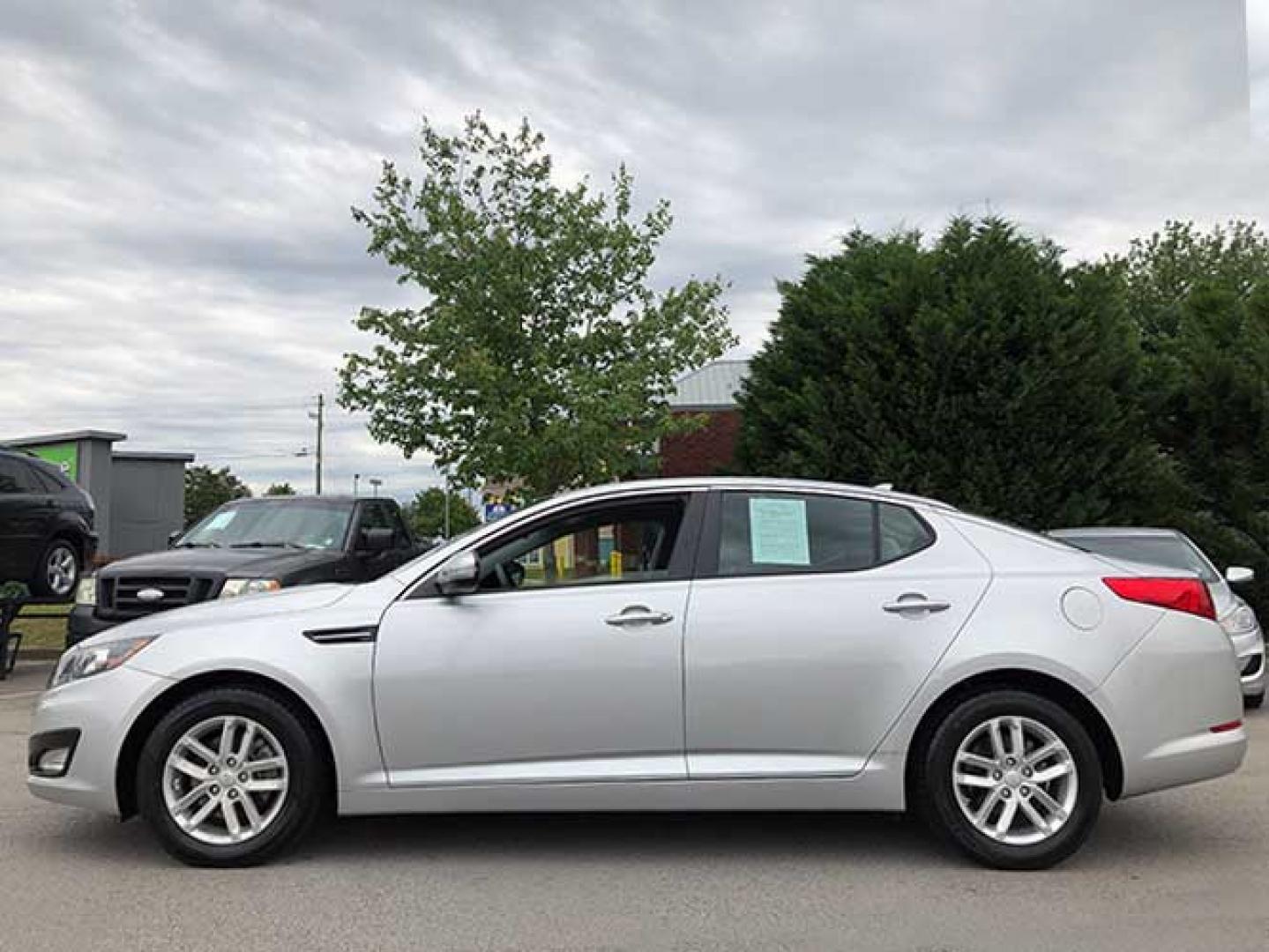 2012 Kia Optima LX MT (5XXGM4A78CG) with an 2.4L L4 DOHC 16V engine, 6-Speed Automatic transmission, located at 620 Jesse Jewell Pkwy, Gainesville, GA, 30501, (678) 450-1000, 34.305923, -83.809784 - Photo#2