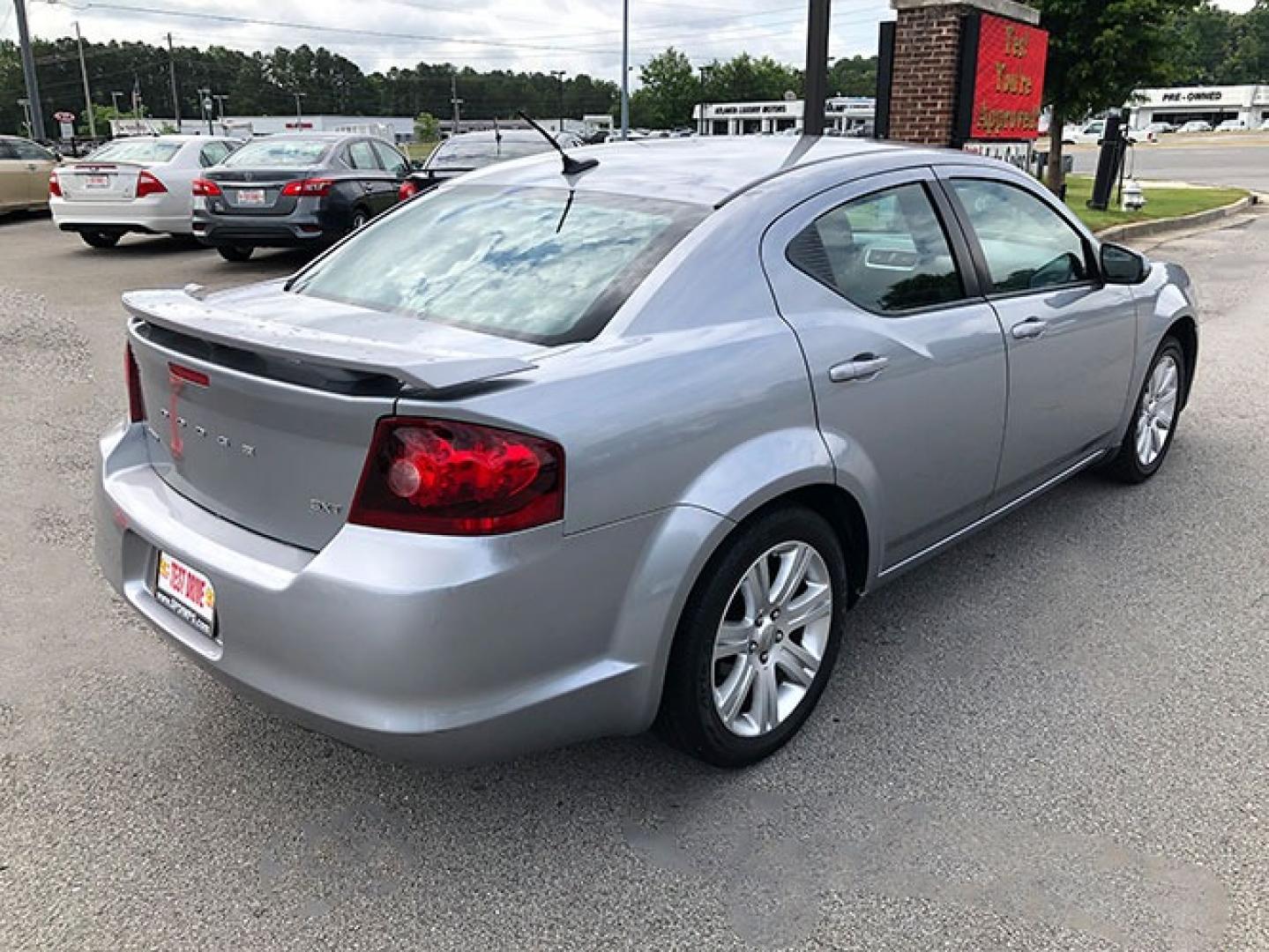 2014 Dodge Avenger SXT (1C3CDZCB3EN) with an 2.4L L4 DOHC 16V engine, 6-Speed Automatic transmission, located at 620 Jesse Jewell Pkwy, Gainesville, GA, 30501, (678) 450-1000, 34.305923, -83.809784 - Photo#6